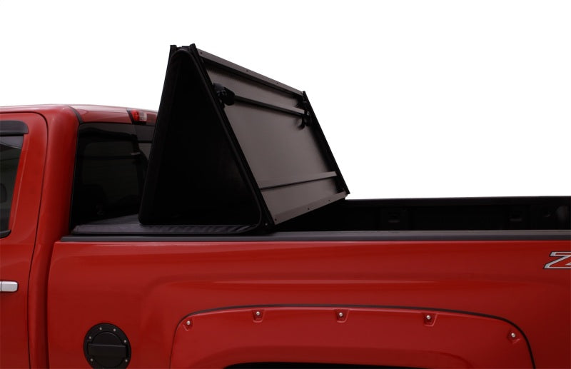 Lund 04-15 Nissan Titan (5.5ft. Bed) Hard Fold Tonneau Cover w/Bracket Kit - Black 969450