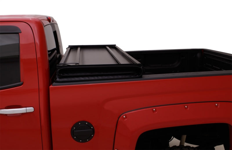 Lund 04-15 Nissan Titan (5.5ft. Bed) Hard Fold Tonneau Cover w/Bracket Kit - Black 969450