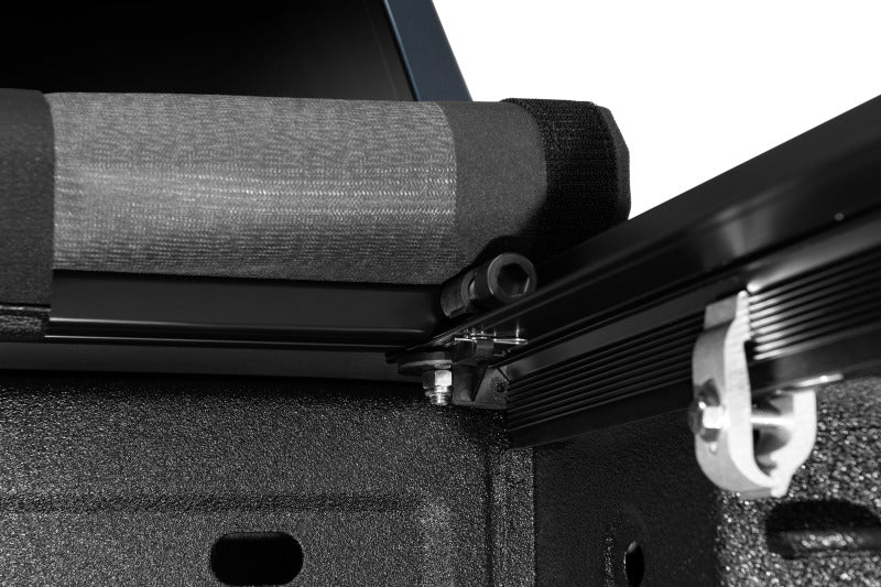 Lund 07-17 Chevy Silverado 1500 (6.5ft. Bed) Genesis Elite Roll Up Tonneau Cover - Black 96893