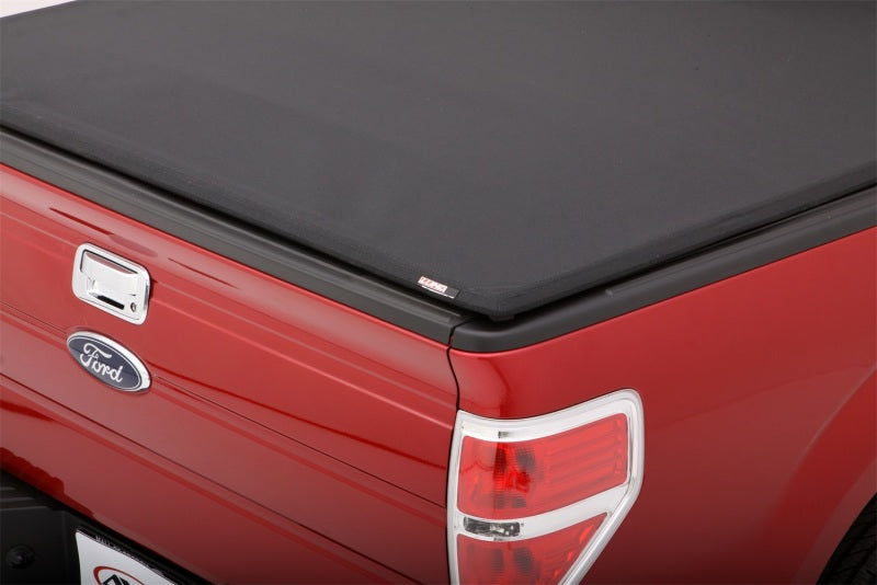 Lund 99-17 Ford F-250 Super Duty (6.5ft. Bed) Genesis Elite Tri-Fold Tonneau Cover - Black 95850
