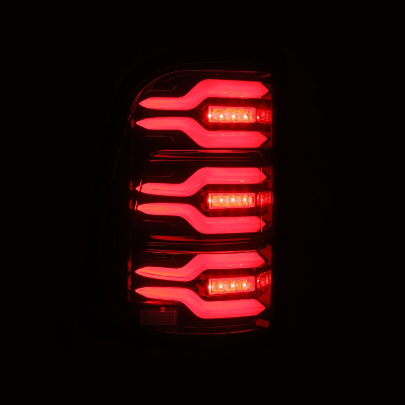 AlphaRex 19-21 Dodge Ram 1500 Luxx-Series LED Tail Lights Black/Red w/Activ Light/Seq Signal 640050