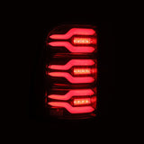 AlphaRex 19-21 Dodge Ram 1500 Luxx-Series LED Tail Lights Black/Red w/Activ Light/Seq Signal 640050