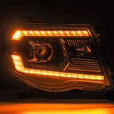 AlphaRex 05-11 Toyota Tacoma LUXX LED Projector Headlights Plank Style Alpha Black w/Activ Light/DRL 880739